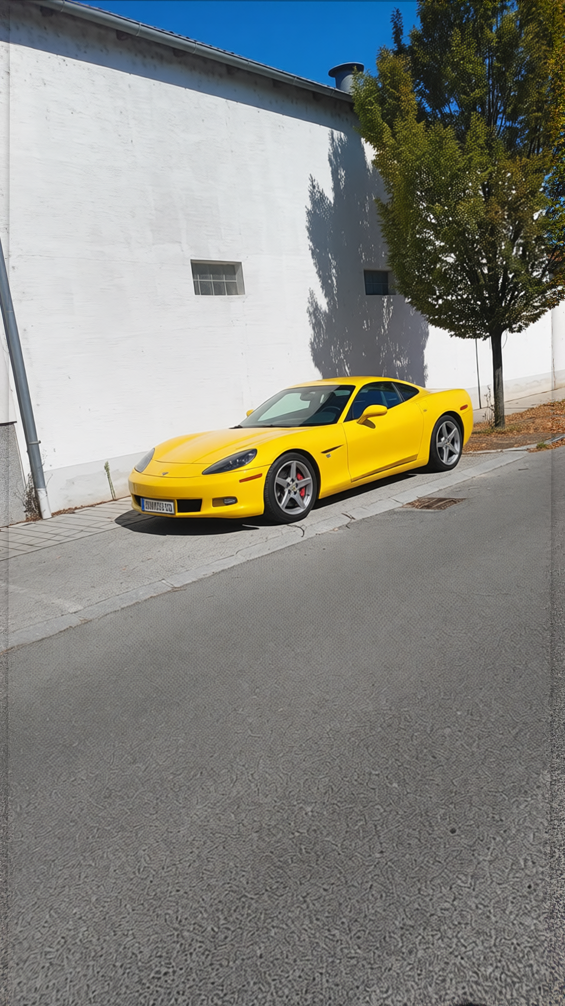 Car rendered in Racing Yellow gloss paint