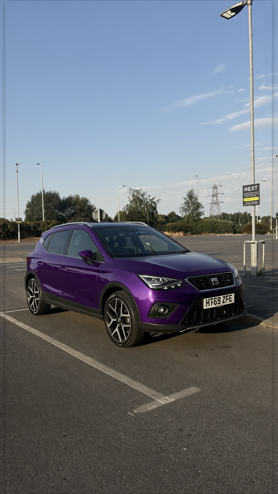 Seat Ateca rendered in Midnight Purple gloss paint