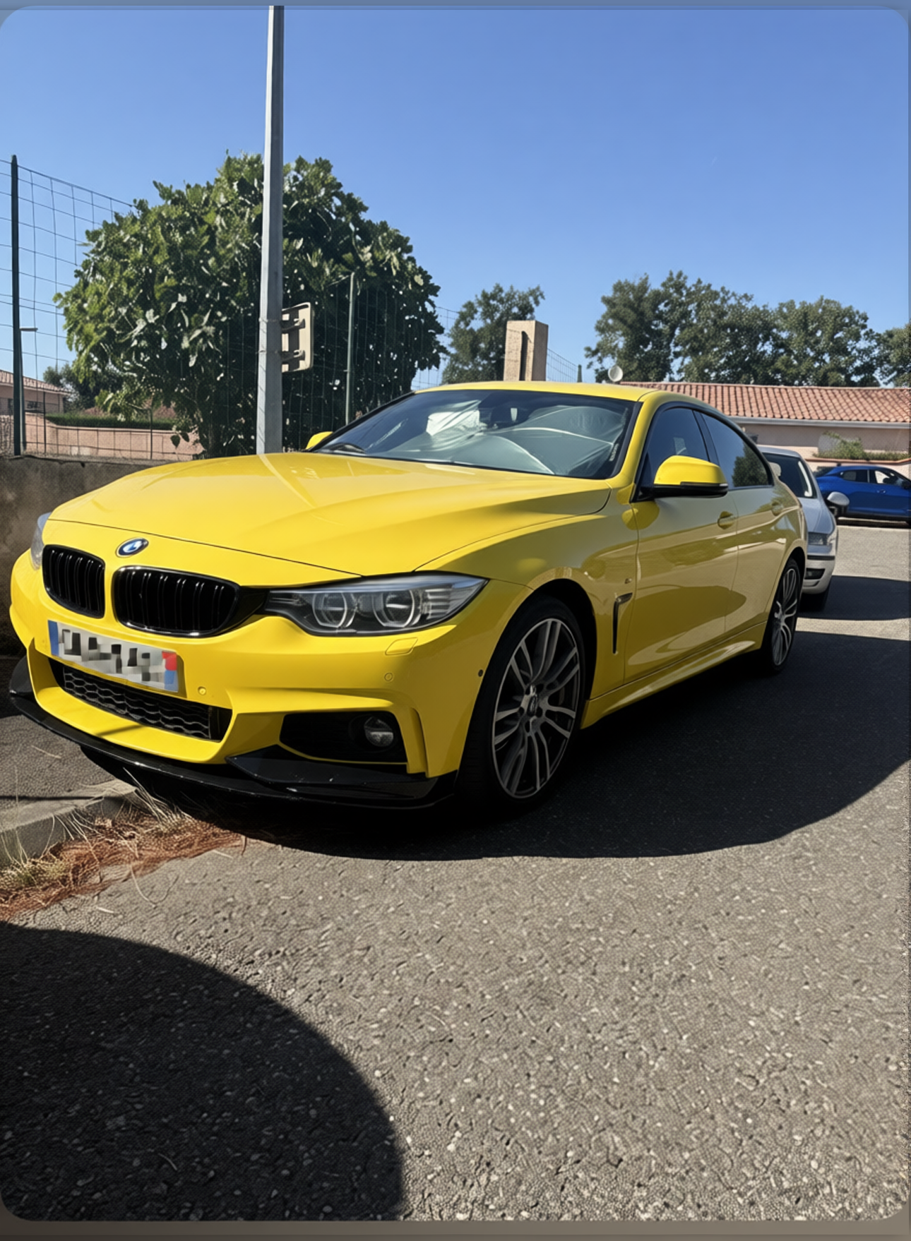 Car rendered in Racing Yellow gloss paint