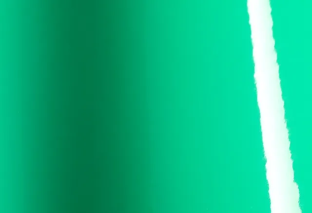 Avery Dennison Gloss Emerald Green Pearlescent vinyl wrap film texture · Specced